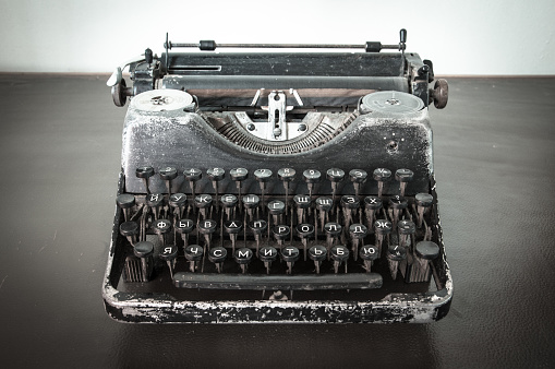 Vintage typewriter on an old office desk.