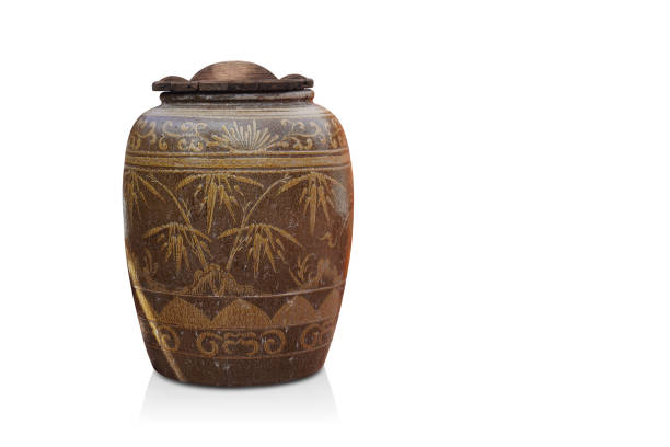 istock front view old wooden lid on brown and yellow pot on white background, object, vintage, retro, decor, copy space 1398648577