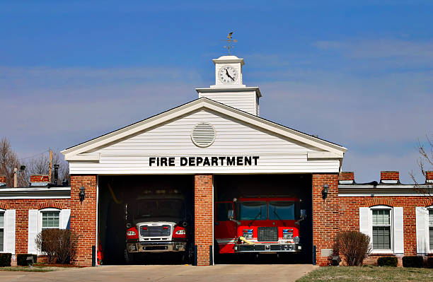 Urban Fire Station House An urban fire station ready to go fire station stock pictures, royalty-free photos & images