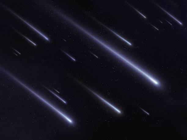 istock Meteor shower in the night sky. Bright meteor trails. 1398649879