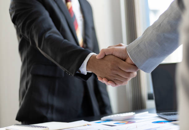 istock Handshake. Concept of cooperation, teamwork and partnership business relationship. 1398651384