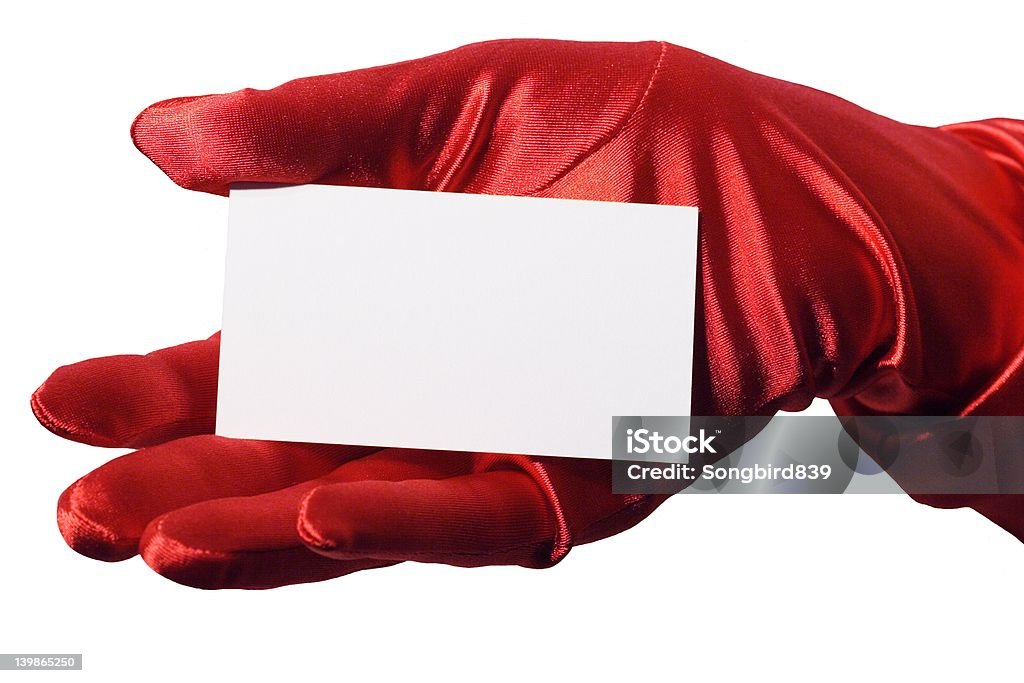 Blank Business Card Hers Blank business card in elegant female hand gloved with sparkly red satin.  Isolated. Glove Stock Photo