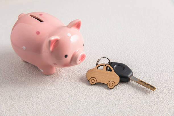 istock keys with car and  piggy bank 1398654018