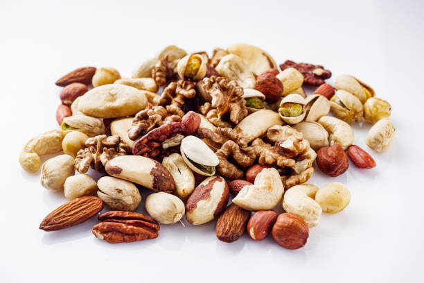 istock set of different nuts on a white acrylic background 1398655526