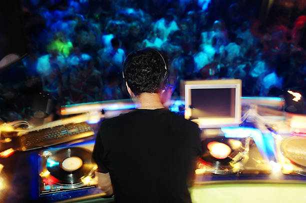 DJ performing in the club stock photo