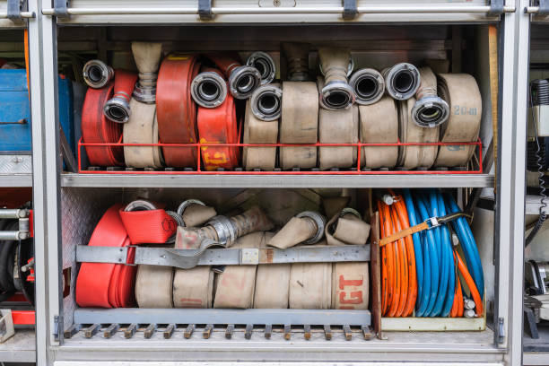 rescue and firefighting truck equipment - fire hose imagens e fotografias de stock