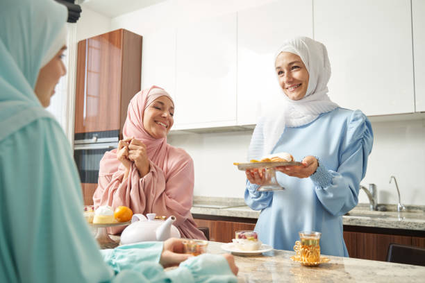 istock Good hostess welcoming her guests with tasty lunch 1398659132