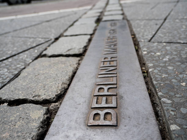 istock Berlin wall sign on the street, Berliner Mauer 1398659585