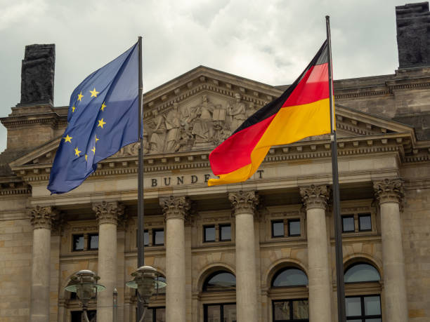 istock German and European flag at the building. 1398659686