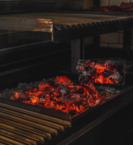 istock Image of burning coals in a restaurant grill 1398662357