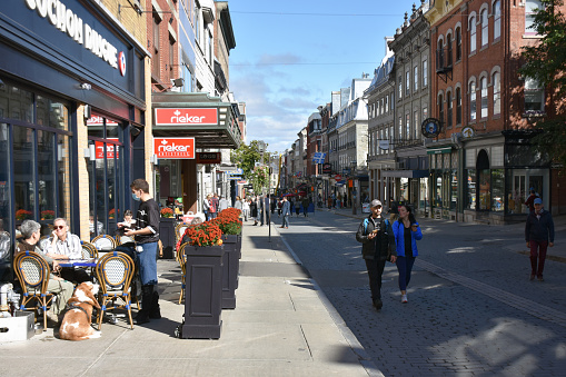 Shopping District In Quebec City Canada, Building Exterior, Advertisement Sign, Retail Store, People Walking, Eating And Drinking In A Restaurant, Looking For Items To Buy Scenery During Autumn Season. Photography With Nikon D7200 DSLR Camera