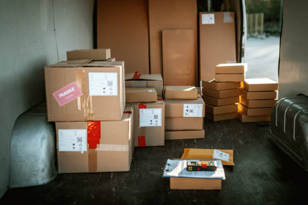 istock Courier van full of parcels and boxes 1398663332