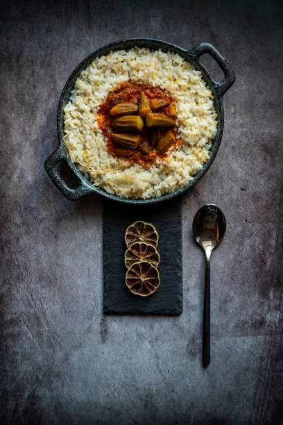 istock Okra and meat stew in a pot like plate. Top view, copy space 1398663859