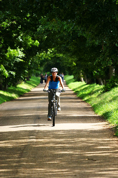 istock woman on mountainbike 139866608