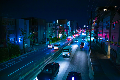 A night traffic jam at the downtown street in Tokyo. High quality photo. Setagaya district Tokyo Japan 05.10.2022 Here is highway side in Tokyo