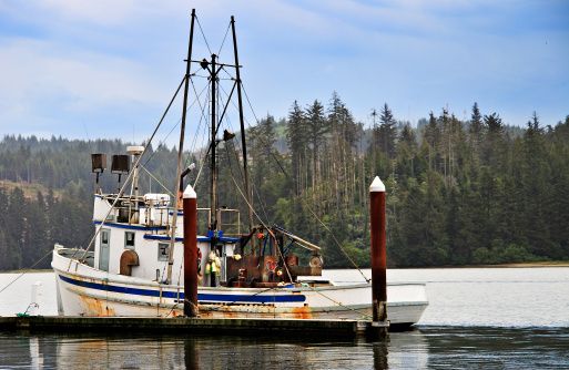 A fishing boat docked in harbor