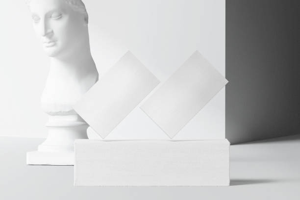 istock Clean minimal business card mockup on white block with afrodite 1398672940