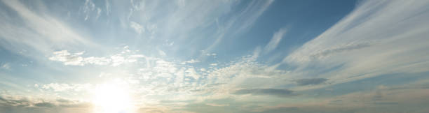istock Blue sky clouds, natural background with dawn sun, white cloud and skyline 1398674106