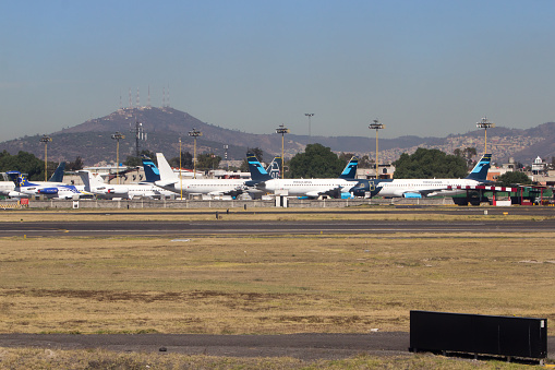 January 15th, 2016. Ciudad de México, Mexico. Few airplanes of mexicana de aviación are on the ground. Mexicana was a principal airline in Mexico, but it stopped their operations in August 28th of 2010, leaving their airplanes in the International Airport of Mexico City (AICM, Aeropuerto Internacional de la ciudad de Mexico).