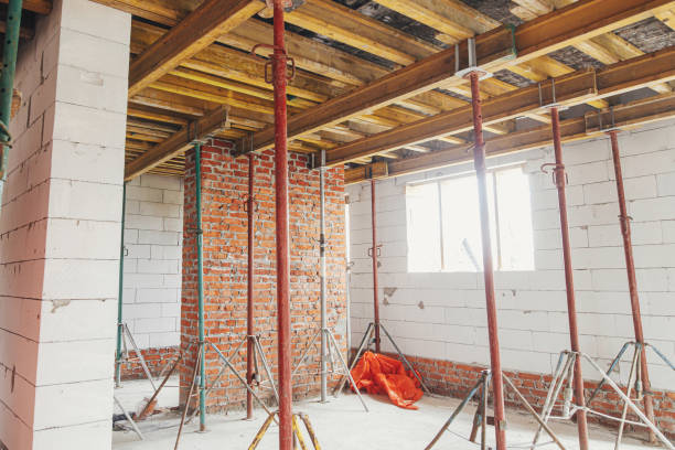 istock Slab formwork for concrete pouring. Concrete slab construction for ceiling at construction site. Process of house building, construction formwork 1398676434