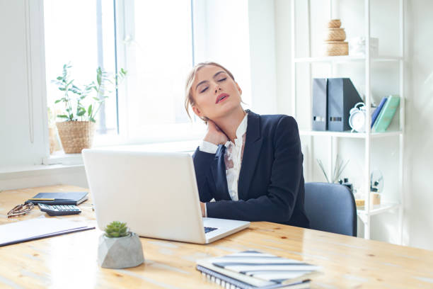istock Overworked stressed businesswoman suffering from headache and thinking how to end work 1398677603