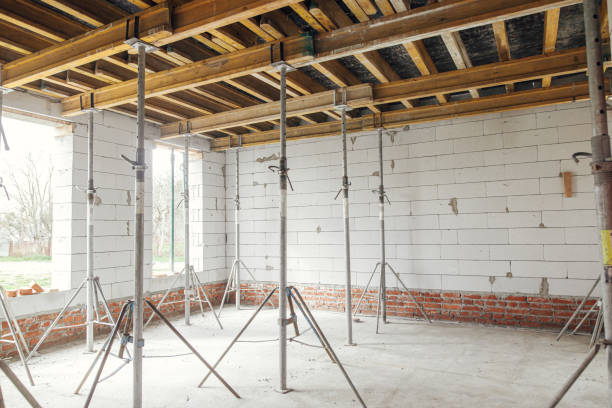 istock Slab formwork for concrete pouring. Concrete slab construction for ceiling at construction site. Process of house building, construction formwork 1398678379
