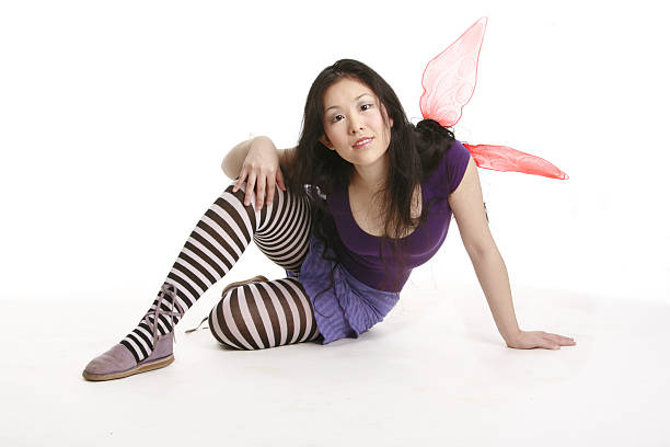 istock Smiling fairy with pink wings 139868219