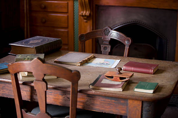 istock Old fashioned desk and books 139868279