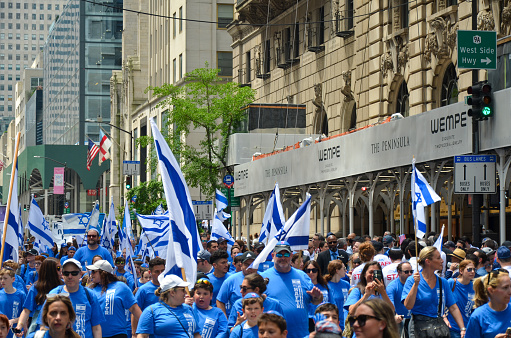 Participants are seen marching during the parade in New York City to celebrate the 74th anniversary of founding of the Israeli nation on May 22, 2022.