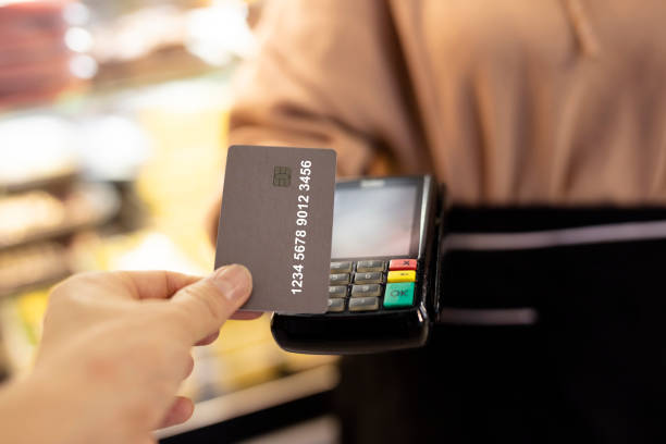istock paying contact less with credit card 1398683626