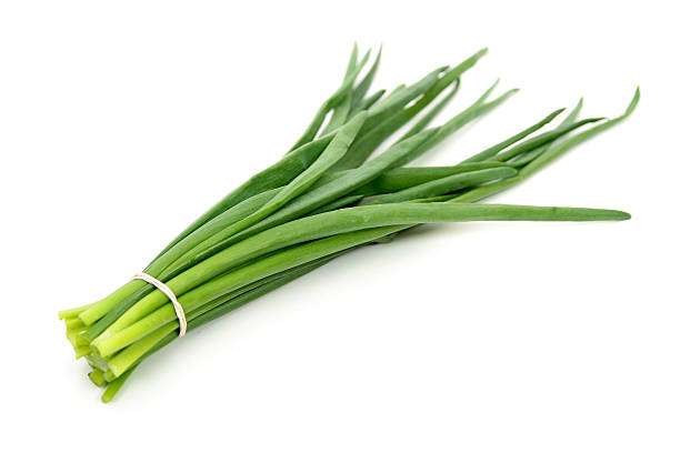 istock A bundle of chives on a white background 139868391