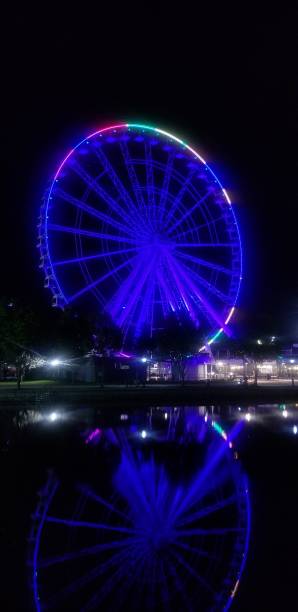 istock Montreal Old Port wheel reflected in water 1398686586