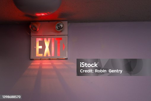 istock A exit sign on a white wall 1398688570