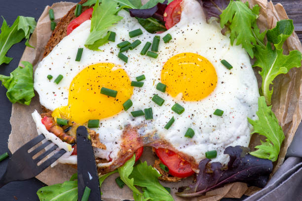 istock fried eggs and salad, delicious and healthy, ready to eat 1398688890