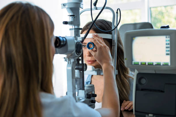 istock Checking the eye vision by a female doctor 1398693454