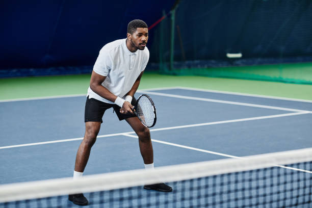 African American Man Playing Tennis