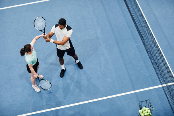 istock Friends Playing Tennis Minimal 1398695011