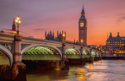 The Westminster Bridge, London's River Thames and Famous London symbol of The Elizabeth Tower or known as Big Ben and the House of Parliament after sunset. Big Ben and House of Parliament in n London, England, The United Kingdom.