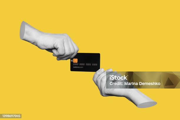 The Black Plastic Credit Card Is In 3d Hands Of Two Women Holding It From Different Sides Stock Photo - Download Image Now