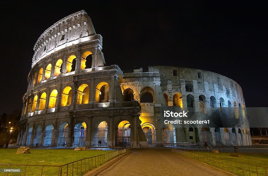 Rome Colosseum (Colosseum) The roman colosseum in the heart of the roman city. Taken at night to show the illumination. Architecture Stock Photo