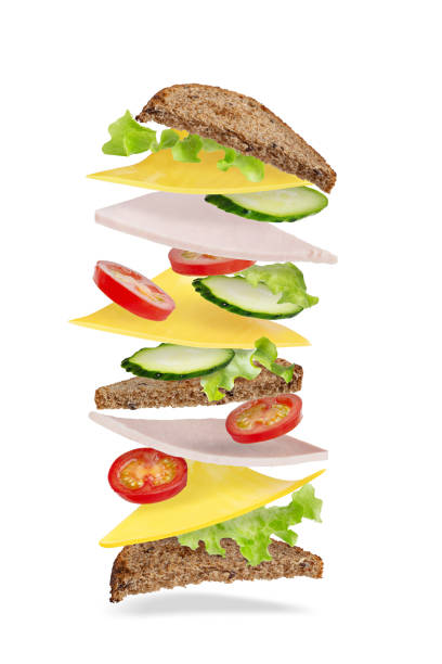 istock big sandwich with ham and cheese levitating on white background 1398701690