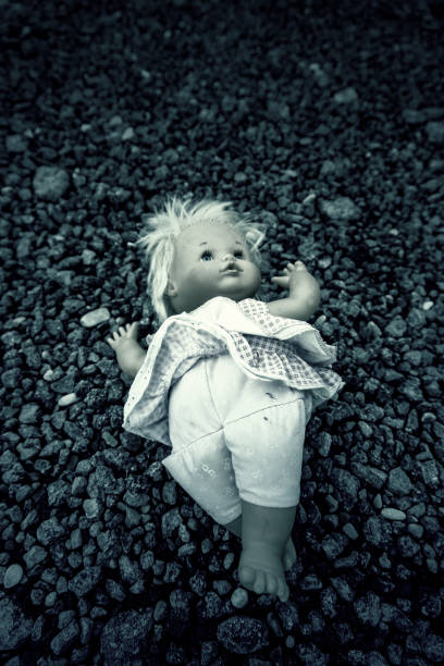 Detail of old abandoned and lonely toy, dirt and sadness