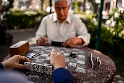 A selective focus shot of mahjong tiles on a table