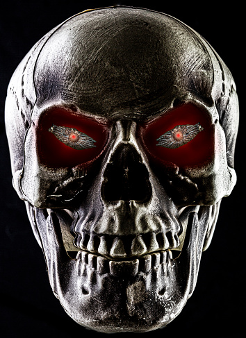 Studio shot of a skull with evil eyes