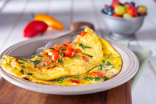Homemade Vegetable Omelet with Tomato, Broccoli, Spinach, Onion and Red Bell Pepper