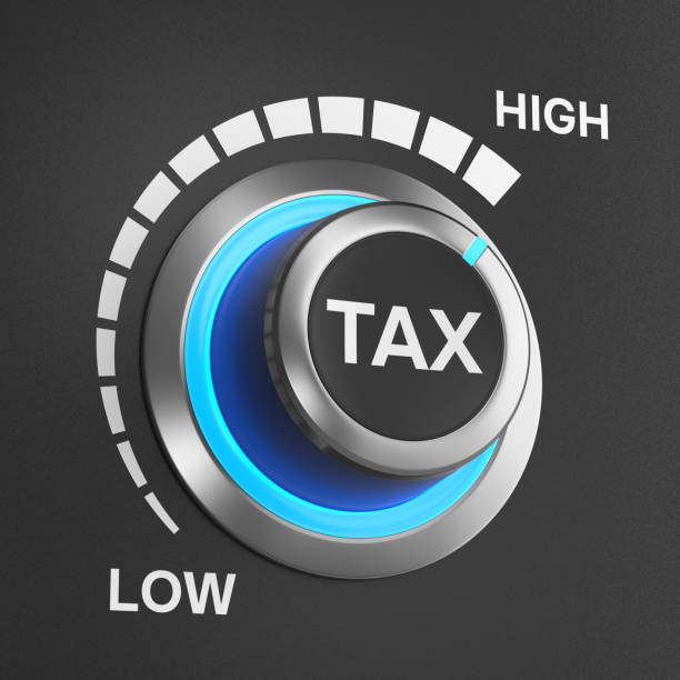 istock Turning knob control from low to high taxation rate 1398706370