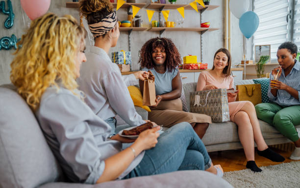 istock Pregnant woman getting presents at baby shower 1398706708