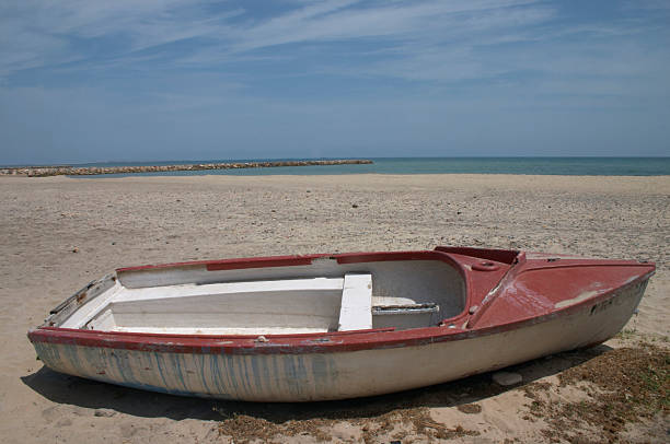 istock old boat in the beach 139871155