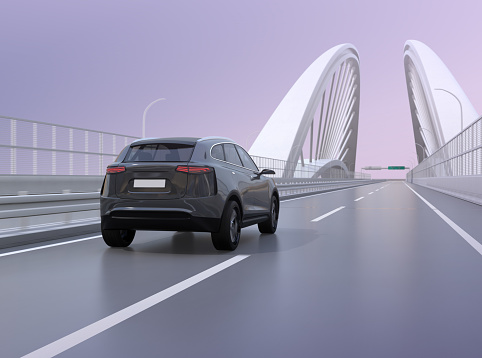 Rear view of black electric SUV driving on the highway bridge. 3D rendering image.