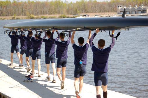 The Georgetown 8-man heavyweight crew prepares to set their boat in the water